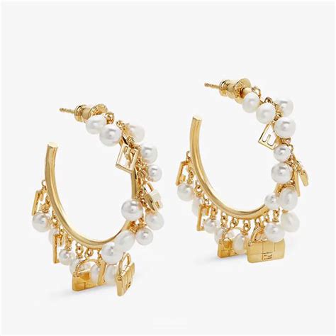 fendi gold earrings|Fendi baguette hoop earrings.